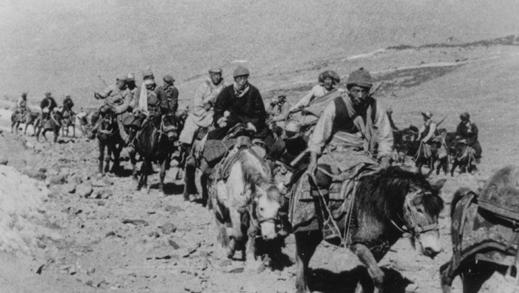 The 14th Dalai Lama, Tenzin Gyatso, accompanied by Khampa bodyguards from the eastern province of Kham, departing Tibet for exile in India in March 1959. (Photo/OHHDL)